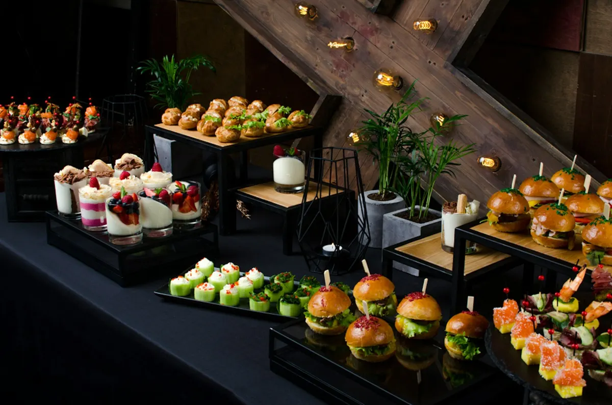Evening buffet with sliders, desserts and small plates